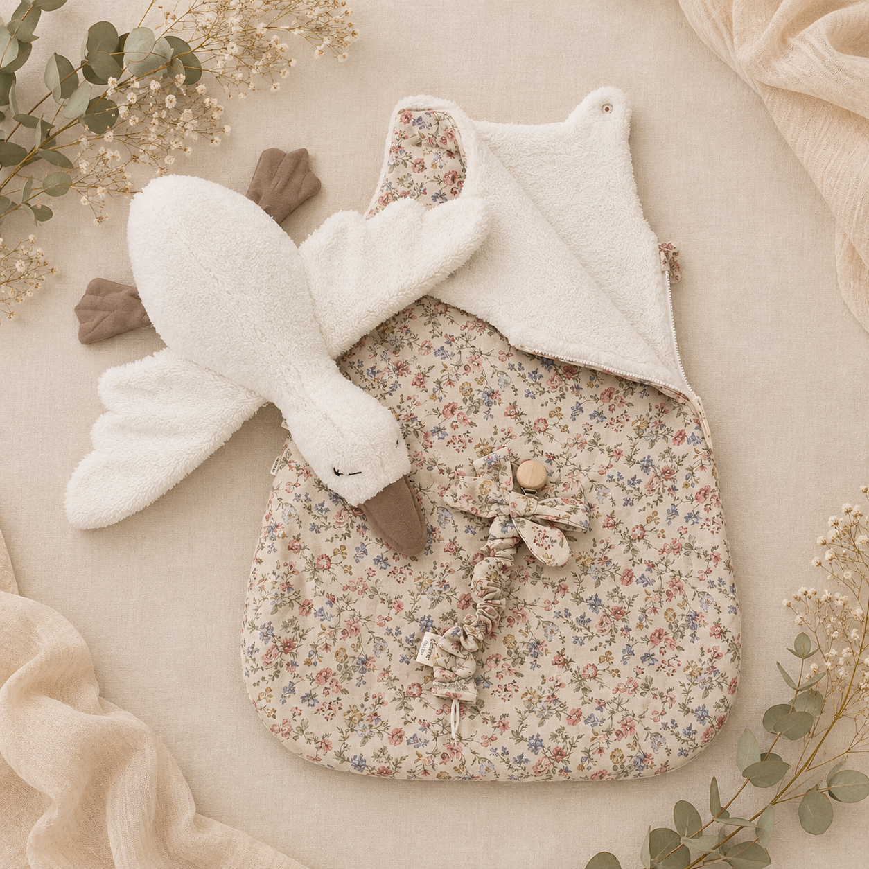 Floral baby set, fleece sleeping bag with a floral outer print, fleece snuggle goose and a ruffled flower print fabric dummy clip 