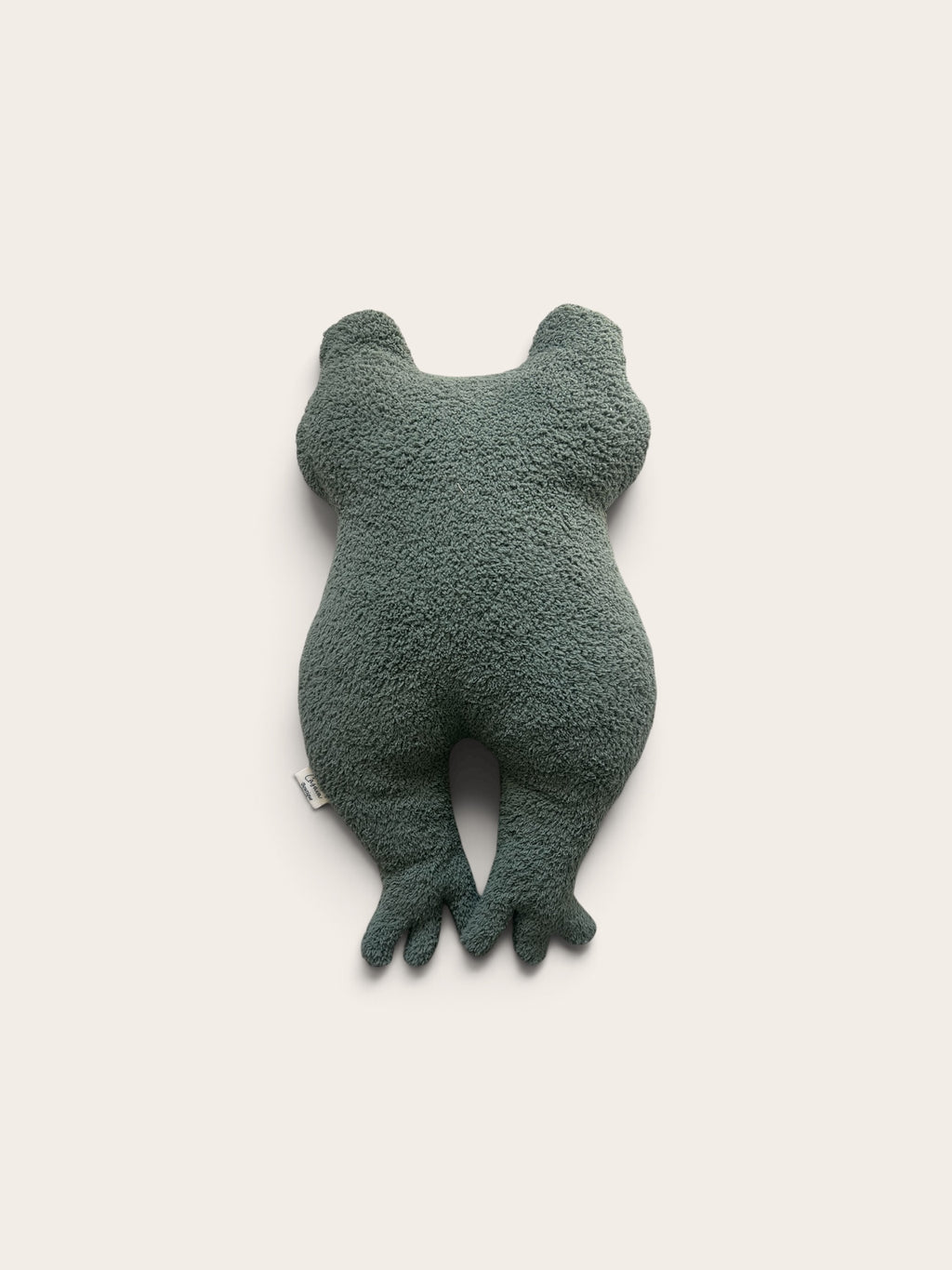 A dark green plush frog toy or cushion with textured fabric, shown from the back against a plain off-white background.