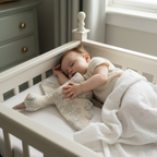 baby sleeping with a waddles the goose snuggle companion 