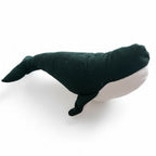 Green and white whale baby comforter plush toy on white background
