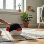 Puffer fish plush toy on nursery rug with baby hand, soft ocean stuffed animal for kids room